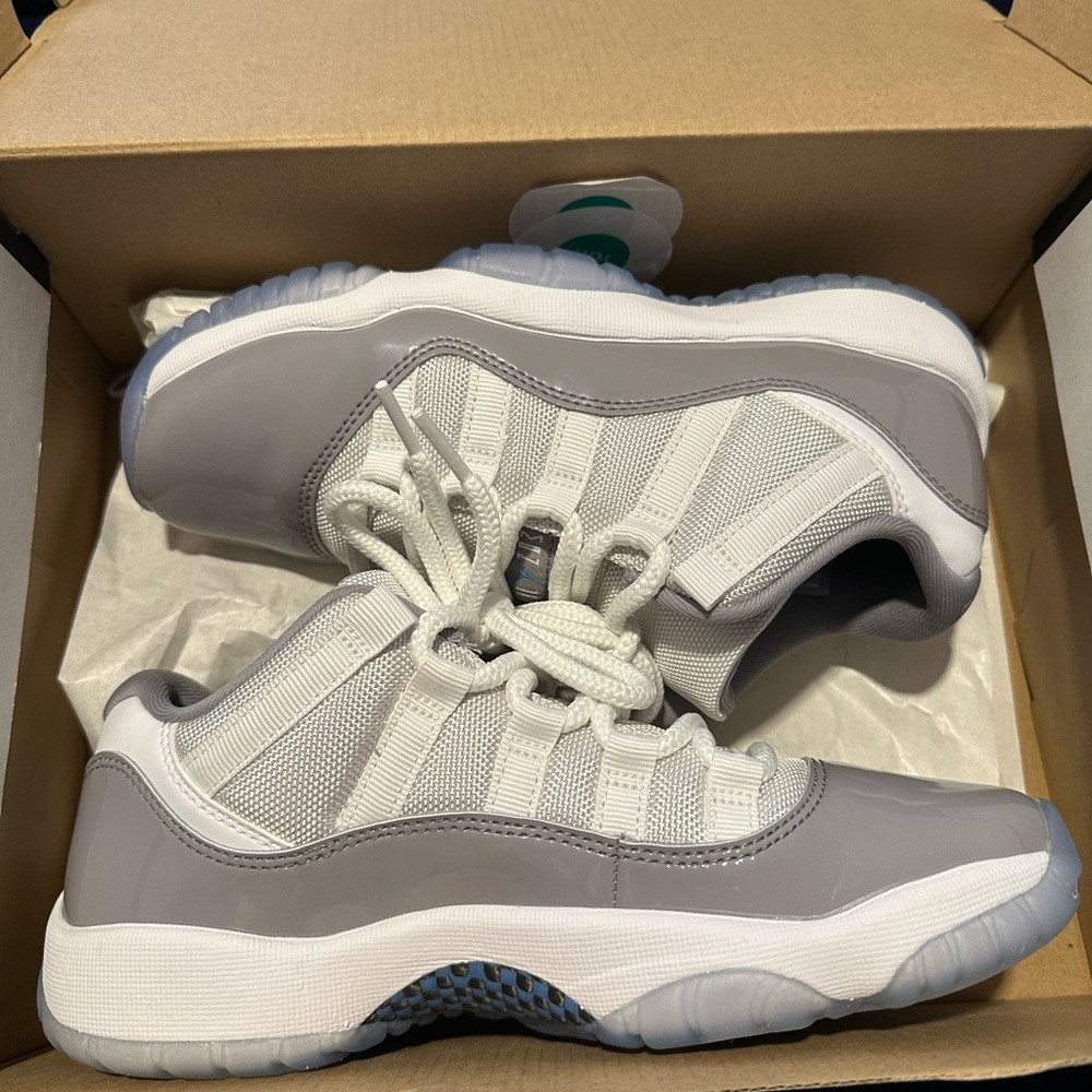 Air Jordan 11 Retro Low White and University Blue Sneakers